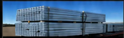 Bundled metal decking panels staged on a trailer ready for delivery
