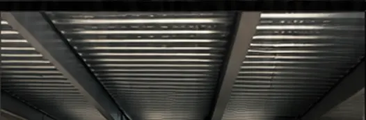 Underside view of cellular metal decking on a structural frame