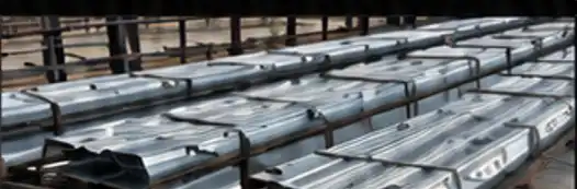 Steel form deck panels installed on an elevated structural frame