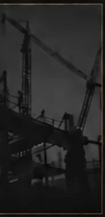 Construction crane silhouette at dusk