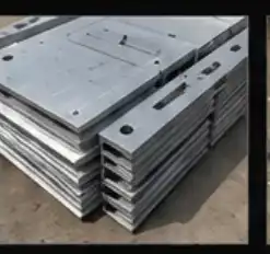 Anchor bolts mounted on a steel base plate